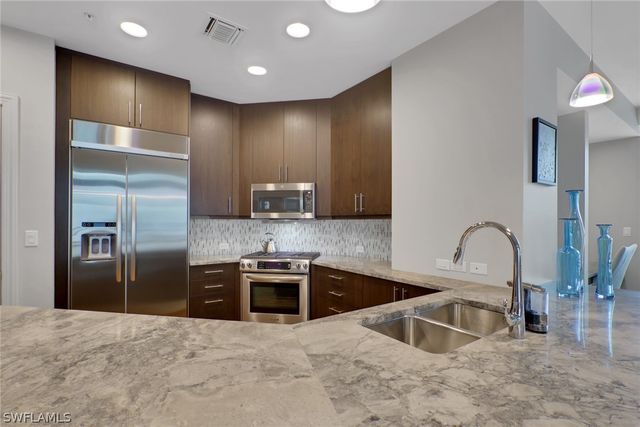 9123 Strada PL 7216, Naples, FL 34108