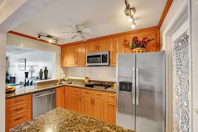 455 Paradise Isle Blvd 104, Hallandale Beach, FL 33009