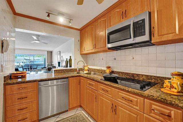 455 Paradise Isle Blvd 104, Hallandale Beach, FL 33009