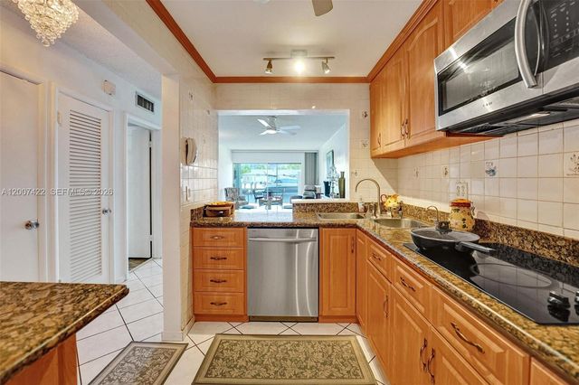 455 Paradise Isle Blvd 104, Hallandale Beach, FL 33009