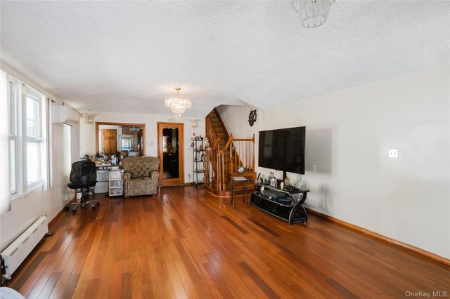 90-62 202nd Street, Hollis, NY 11423