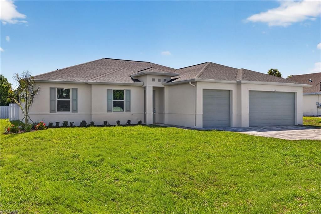 Image 1 of property listing at 2537 SW 11th PL, Cape Coral, FL 33914