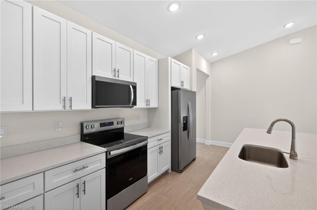 Image 3 of property listing at 2537 SW 11th PL, Cape Coral, FL 33914