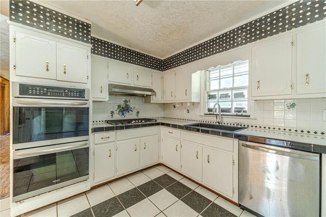 5565 Five Forks Trickum Road, Stone Mountain, GA 30087