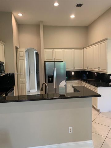 7116 W Pinecreek Way, Coconut Creek, FL 33073