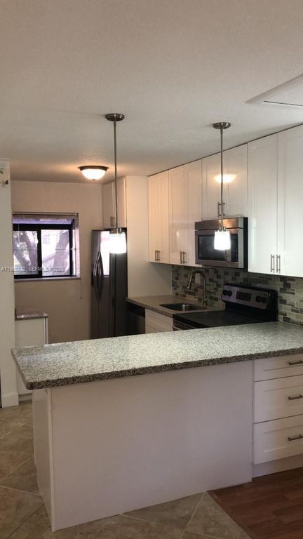 104 Gardens Dr 203, Pompano Beach, FL 33069