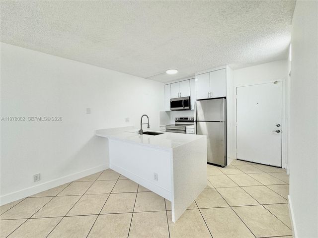 2401 Riverside Dr 407-B, Coral Springs, FL 33065
