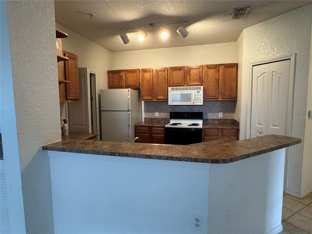 6149 METROWEST BOULEVARD 208, Orlando, FL 32835