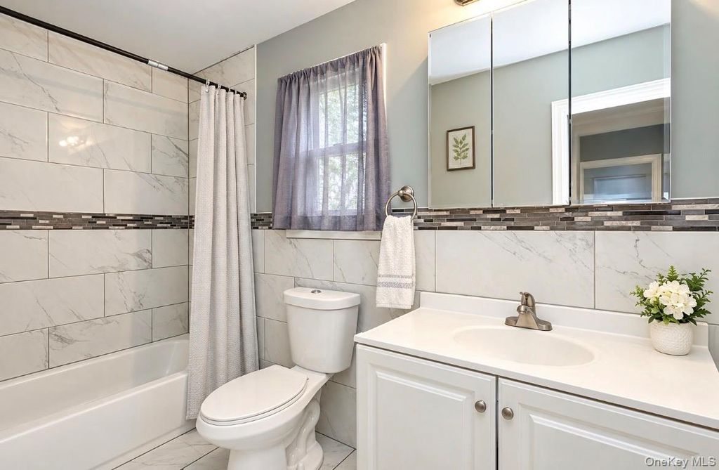 107 W Centennial Avenue, Roosevelt, NY 11575 — photo 5
