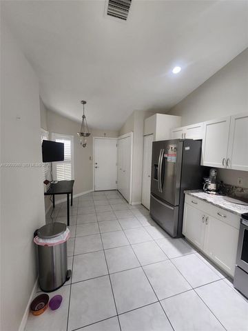 6053 Heliconia Rd, Delray Beach, FL 33484