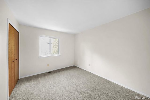 41257 S Woodbury Green Drive, Belleville, MI 48111