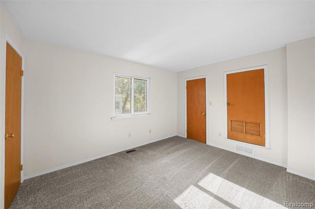41257 S Woodbury Green Drive, Belleville, MI 48111