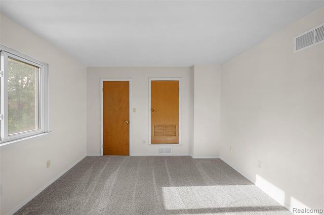41257 S Woodbury Green Drive, Belleville, MI 48111