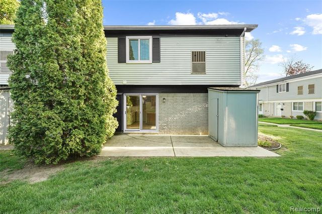 41257 S Woodbury Green Drive, Belleville, MI 48111