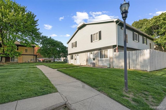 41257 S Woodbury Green Drive, Belleville, MI 48111
