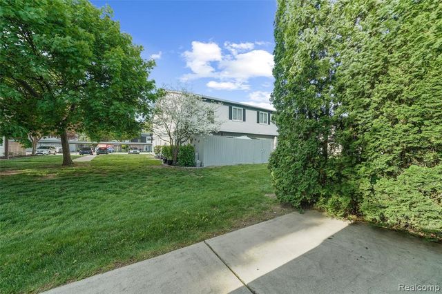 41257 S Woodbury Green Drive, Belleville, MI 48111