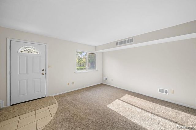 41257 S Woodbury Green Drive, Belleville, MI 48111