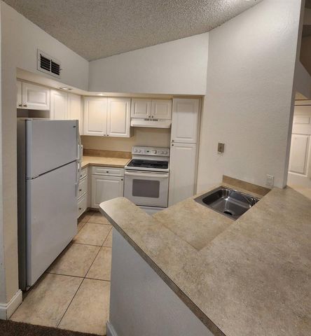 5737 GATLIN AVENUE 423, Orlando, FL 32822