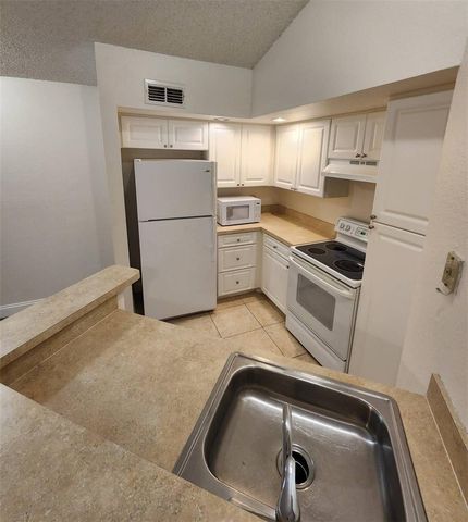 5737 GATLIN AVENUE 423, Orlando, FL 32822