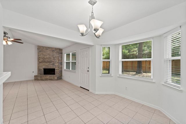 3 W Woodtimber Court, The Woodlands, TX 77381