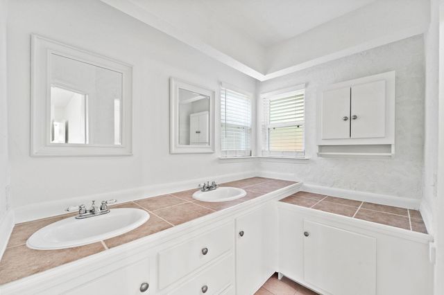 3 W Woodtimber Court, The Woodlands, TX 77381
