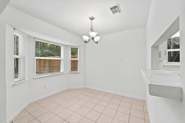 3 W Woodtimber Court, The Woodlands, TX 77381