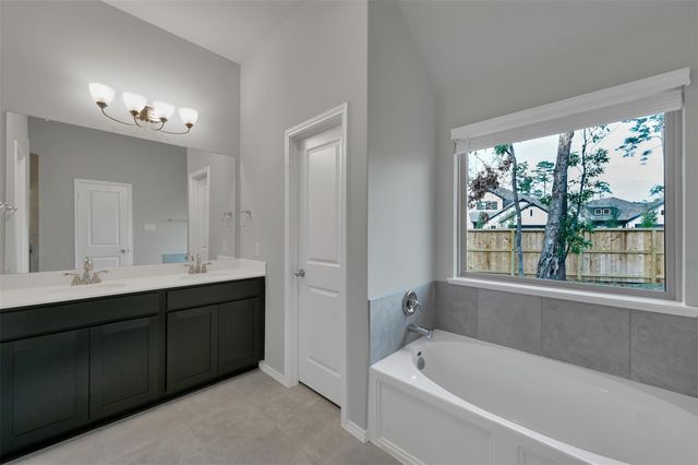 307 Highland Bayou Drive, Conroe, TX 77304