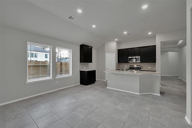 307 Highland Bayou Drive, Conroe, TX 77304