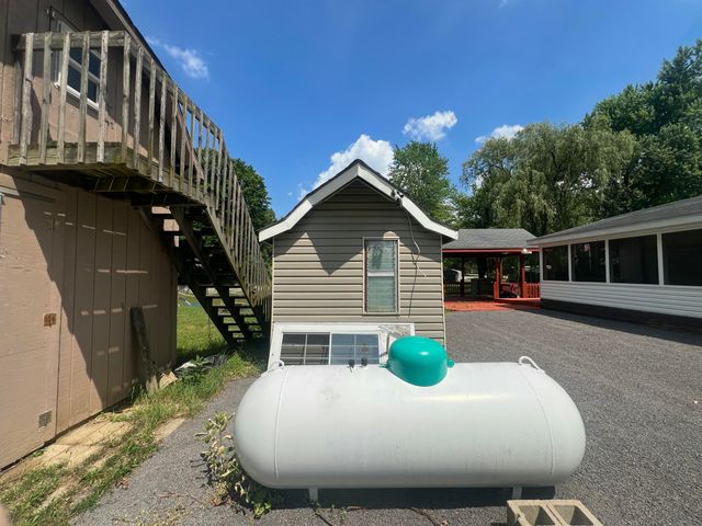 6915 Rowley Drive, Osseo, MI 49266