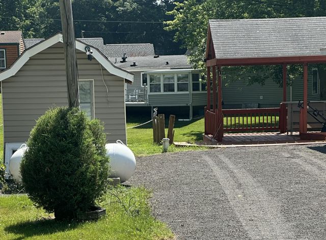 6915 Rowley Drive, Osseo, MI 49266