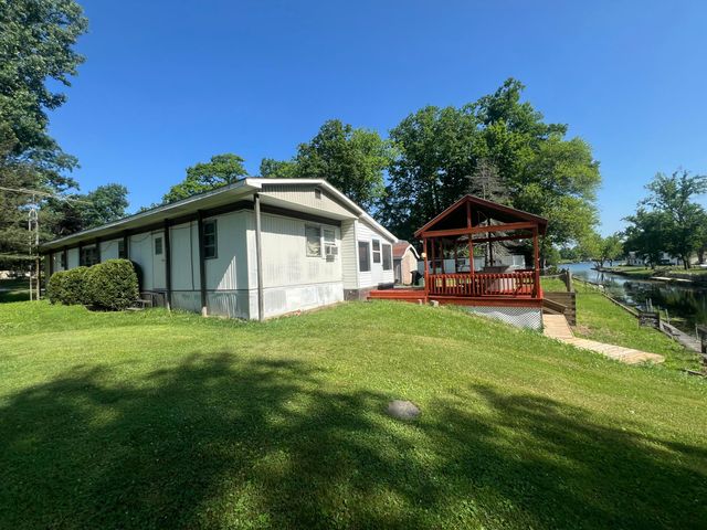 6915 Rowley Drive, Osseo, MI 49266