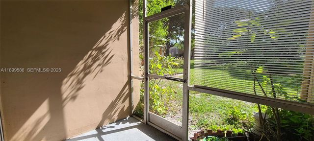 9410 Live Oak Place 109, Davie, FL 33324