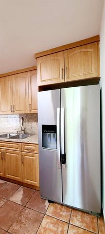9410 Live Oak Place 109, Davie, FL 33324