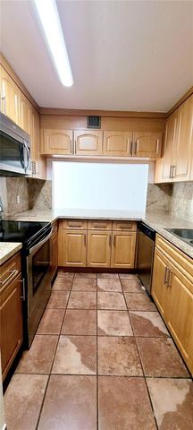 9410 Live Oak Place 109, Davie, FL 33324