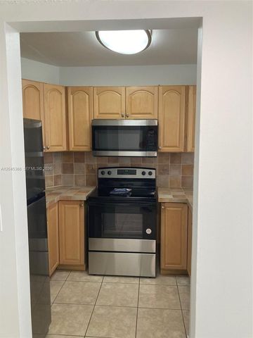 6995 NW 186th St E403, Hialeah, FL 33015