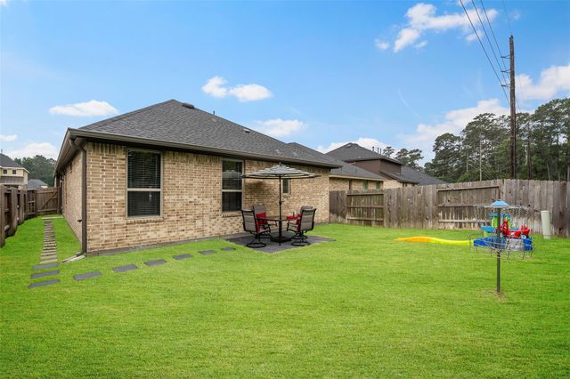 35440 Woodtrace Circle, Pinehurst, TX 77362