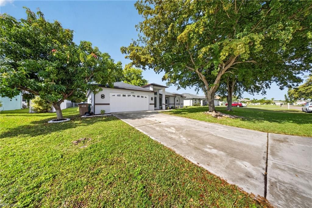 1412 NE 1st ST, CAPE CORAL, FL 33909 — photo 2
