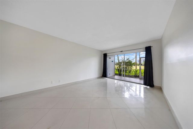 2850 N Palm Aire Drive 104, Pompano Beach, FL 33069