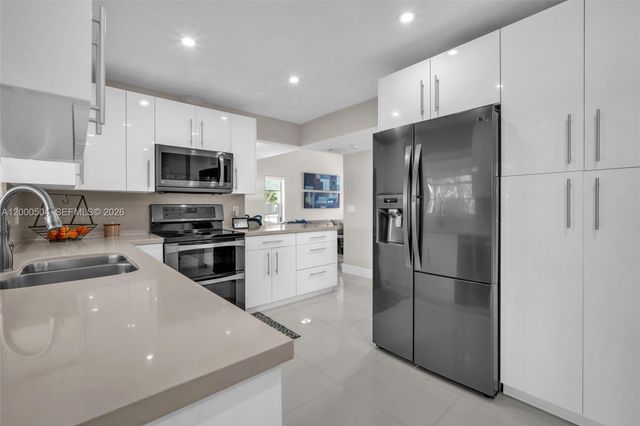 15743 Woodgate Pl E, Sunrise, FL 33326