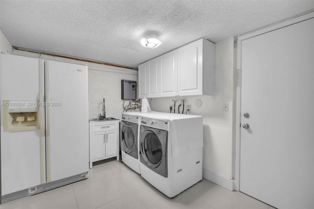 15743 Woodgate Pl E, Sunrise, FL 33326