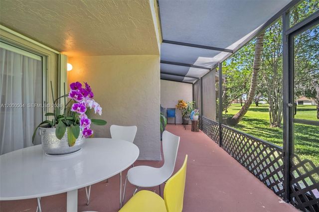 15743 Woodgate Pl E, Sunrise, FL 33326