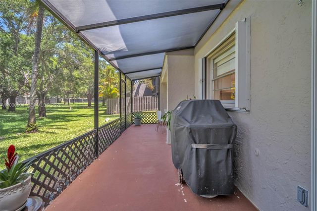 15743 Woodgate Pl E, Sunrise, FL 33326