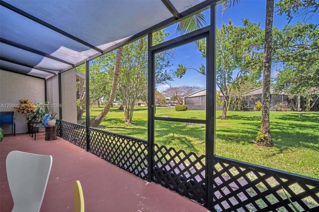 15743 Woodgate Pl E, Sunrise, FL 33326