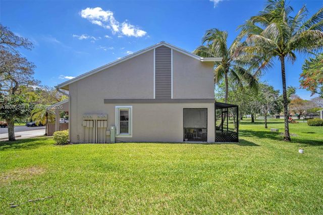 15743 Woodgate Pl E, Sunrise, FL 33326