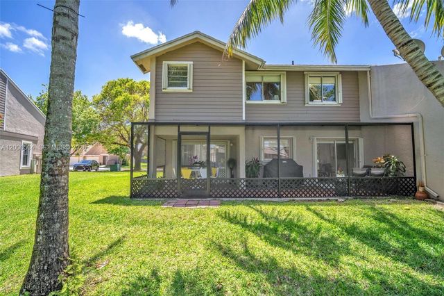 15743 Woodgate Pl E, Sunrise, FL 33326