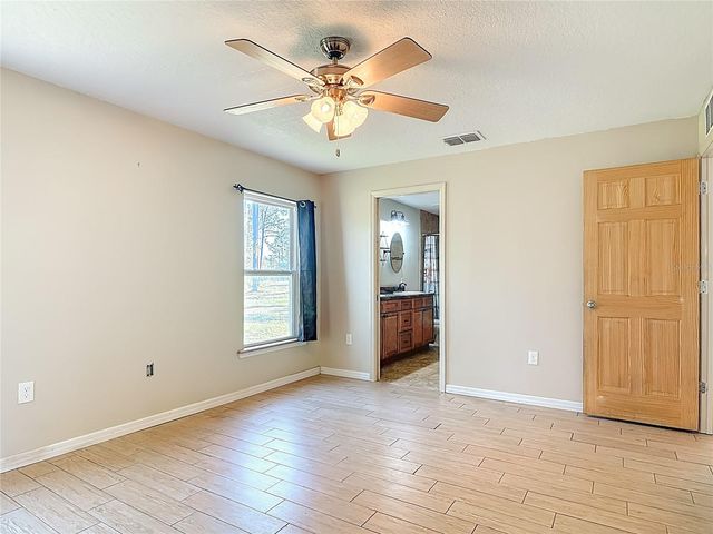 6100 WINNING WOOD TRAIL, De Leon Springs, FL 32130