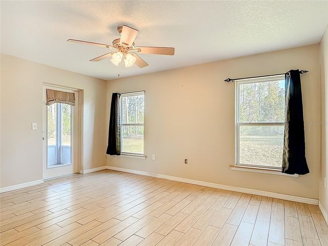 6100 WINNING WOOD TRAIL, De Leon Springs, FL 32130