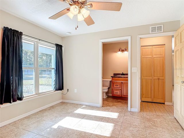 6100 WINNING WOOD TRAIL, De Leon Springs, FL 32130