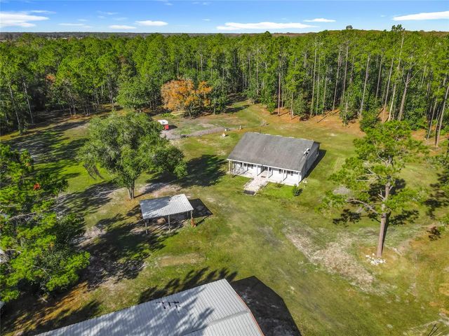 6100 WINNING WOOD TRAIL, De Leon Springs, FL 32130