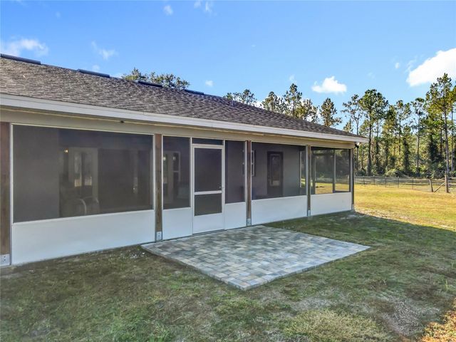 6100 WINNING WOOD TRAIL, De Leon Springs, FL 32130